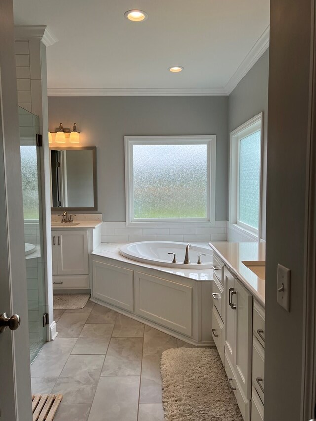 bathroom with tile patterned flooring, vanity, crown molding, and plus walk in shower