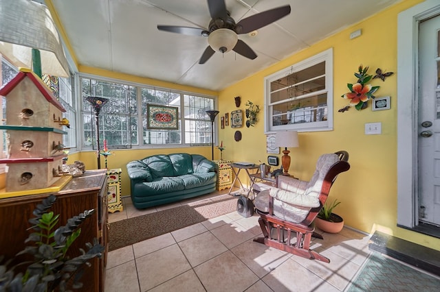 sunroom / solarium with ceiling fan