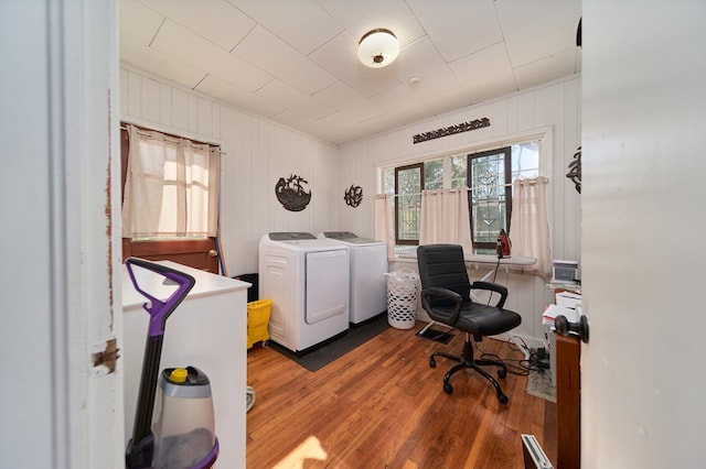 office area featuring independent washer and dryer and wood-type flooring