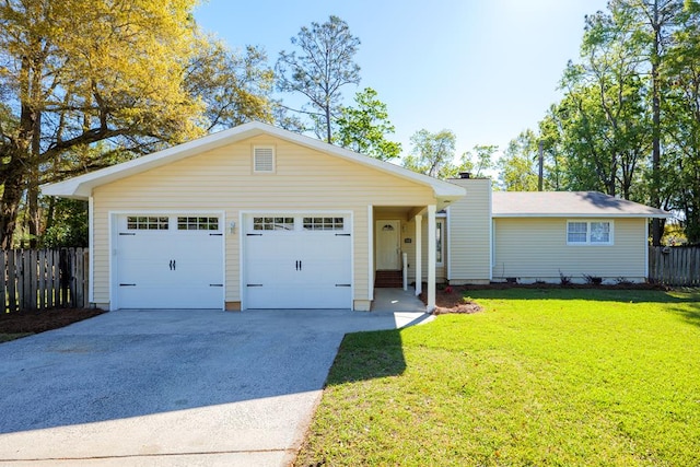 ranch-style home with a garage and a front lawn