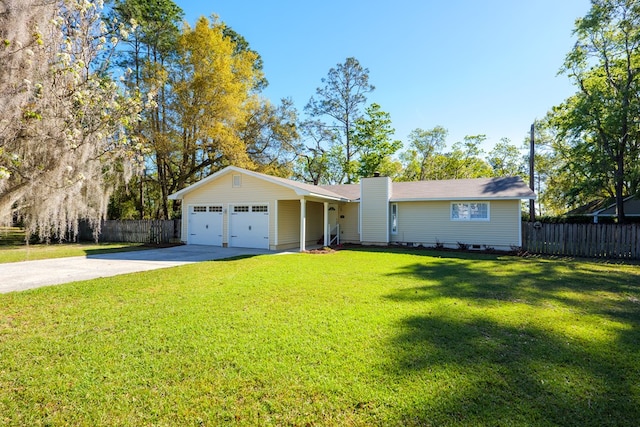 ranch-style house with a front yard and a garage