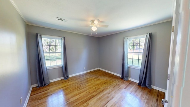 5408 S Camellia Dr, Valdosta, GA 31601 - spare room featuring crown molding, light wood-type flooring, ceiling fan, and baseboards