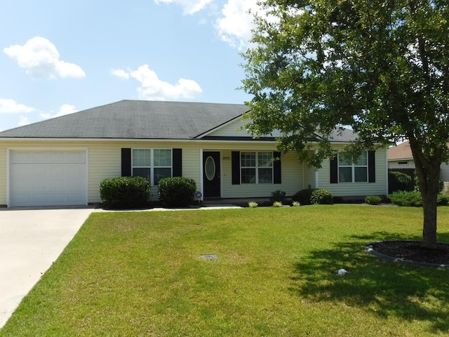 3575 Beulah Cir, Valdosta, GA 31605 - ranch-style home with a garage, concrete driveway, and a front lawn