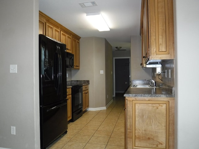 3575 Beulah Cir, Valdosta, GA 31605 - kitchen featuring black appliances, light tile patterned flooring, and dark countertops
