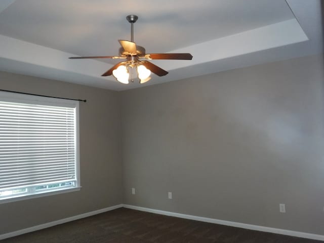 3575 Beulah Cir, Valdosta, GA 31605 - unfurnished room featuring dark colored carpet and ceiling fan
