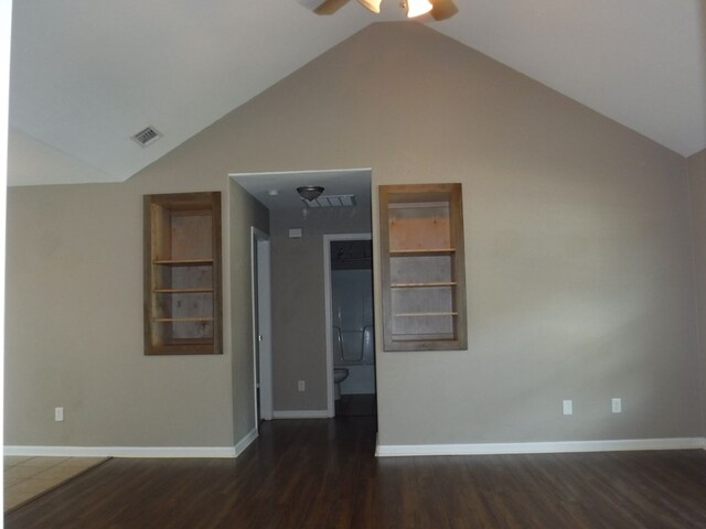 3575 Beulah Cir, Valdosta, GA 31605 - empty room with ceiling fan, vaulted ceiling, and dark wood-style floors