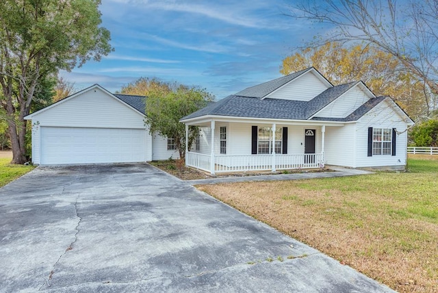 ranch-style home with a porch, a front yard, and a garage