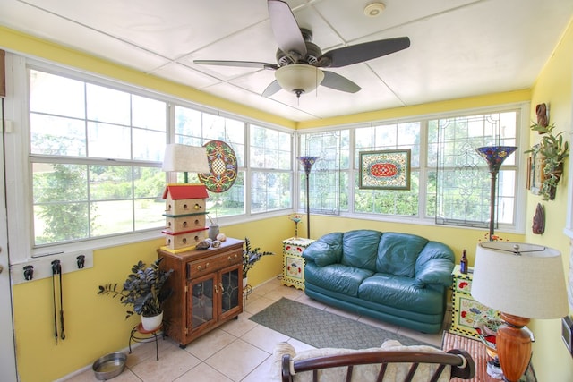 sunroom / solarium featuring tile patterned flooring