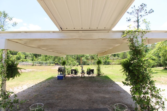 view of patio / terrace featuring a carport