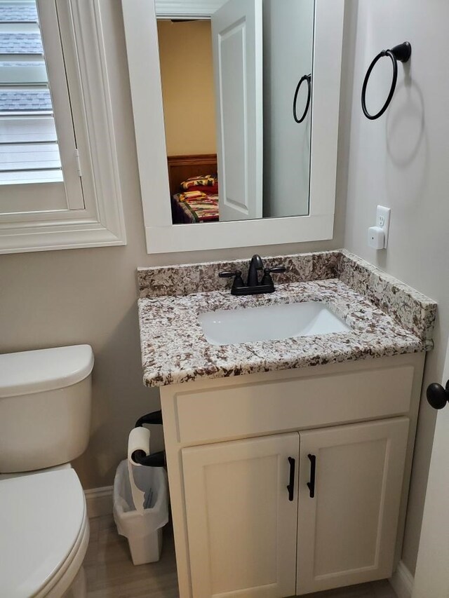 laundry area with cabinets, light tile patterned flooring, and washing machine and clothes dryer