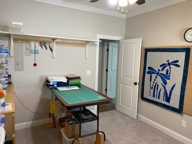 office area featuring light colored carpet