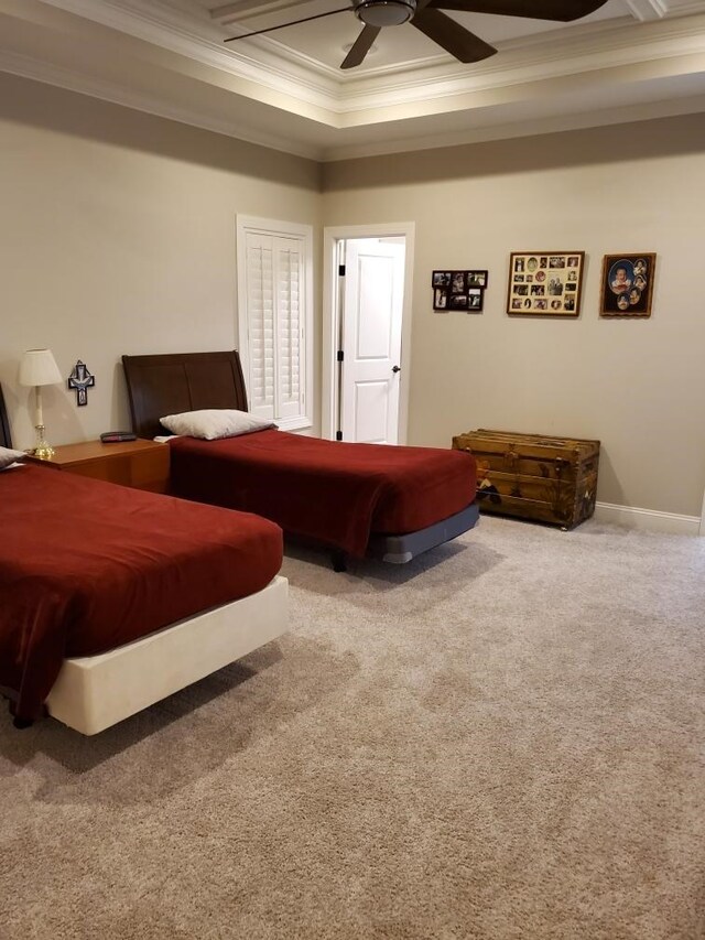 living room with ceiling fan, ornamental molding, coffered ceiling, and beam ceiling