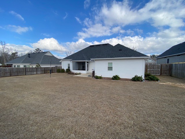 back of property with a patio area