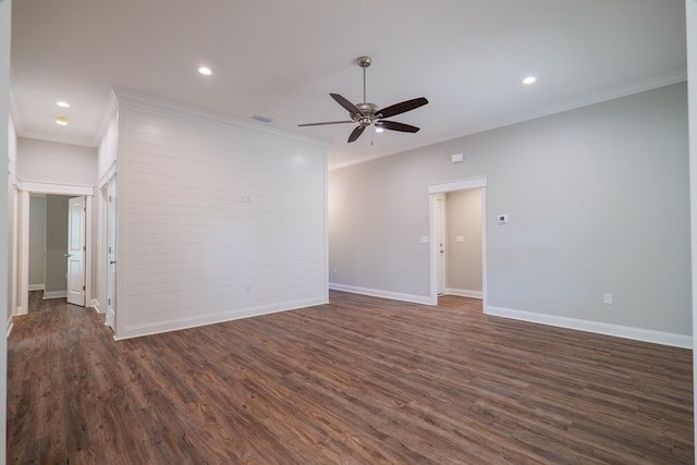 unfurnished room featuring ceiling fan, dark hardwood / wood-style flooring, and ornamental molding