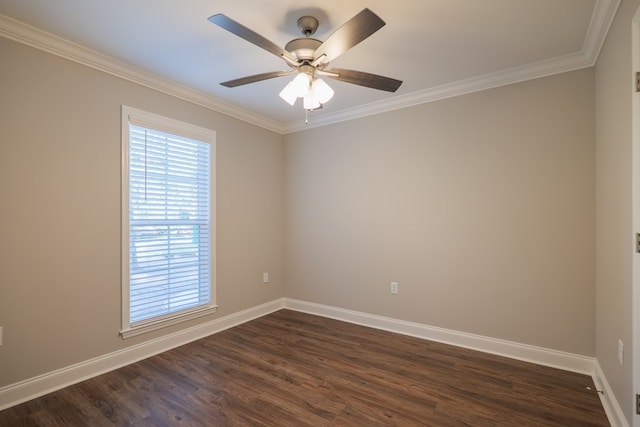 unfurnished room featuring ceiling fan, dark wood-type flooring, and crown molding