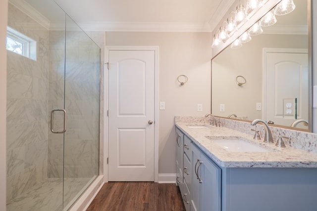 bathroom featuring walk in shower, wood-type flooring, and ornamental molding