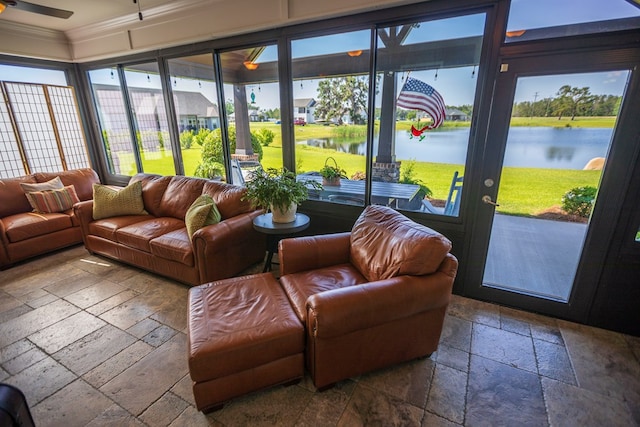5643 Timberwind Cir, Lake Park, GA 31636 - sunroom featuring stone tile floors, healthy amount of natural light, crown molding, and a water view