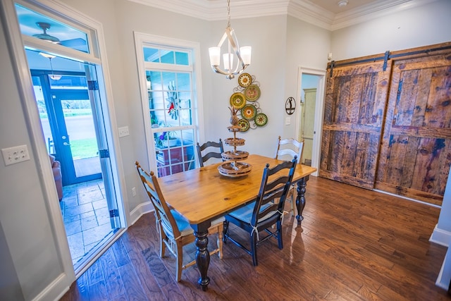 5643 Timberwind Cir, Lake Park, GA 31636 - dining room featuring dark wood-style flooring, crown molding, plenty of natural light, a chandelier, and baseboards