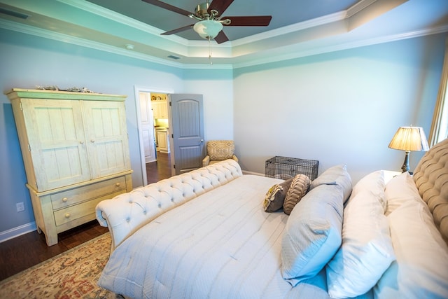5643 Timberwind Cir, Lake Park, GA 31636 - bedroom with a raised ceiling, ornamental molding, baseboards, dark wood finished floors, and ceiling fan
