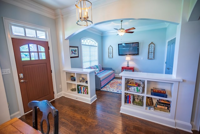 5643 Timberwind Cir, Lake Park, GA 31636 - entrance foyer featuring arched walkways, dark wood-type flooring, crown molding, a ceiling fan, and baseboards