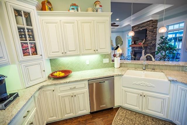 5643 Timberwind Cir, Lake Park, GA 31636 - kitchen featuring stainless steel dishwasher, a sink, ornamental molding, backsplash, and light stone counters