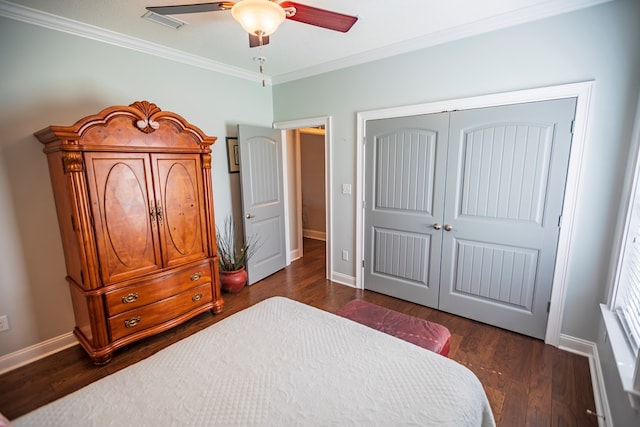 5643 Timberwind Cir, Lake Park, GA 31636 - bedroom with ornamental molding, baseboards, a closet, dark wood finished floors, and a ceiling fan