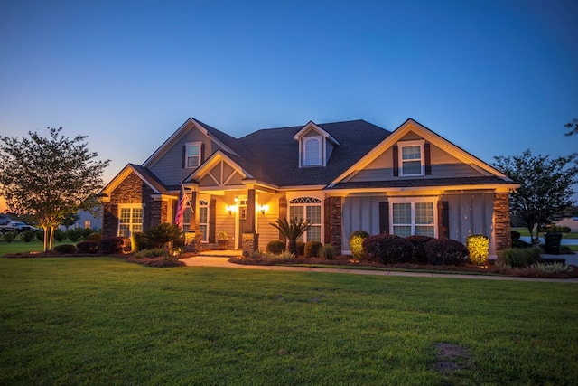5643 Timberwind Cir, Lake Park, GA 31636 - craftsman-style house featuring a lawn, stone siding, and board and batten siding