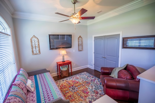 5643 Timberwind Cir, Lake Park, GA 31636 - living area featuring ceiling fan, wood finished floors, crown molding, and baseboards