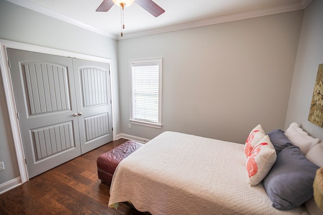 5643 Timberwind Cir, Lake Park, GA 31636 - bedroom with wood finished floors, ornamental molding, baseboards, a closet, and a ceiling fan
