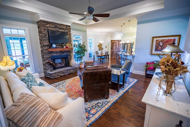 5643 Timberwind Cir, Lake Park, GA 31636 - living room featuring healthy amount of natural light, ceiling fan, a fireplace, baseboards, and ornamental molding