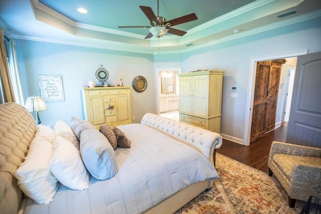 5643 Timberwind Cir, Lake Park, GA 31636 - bedroom featuring ornamental molding, a tray ceiling, wood finished floors, baseboards, and recessed lighting