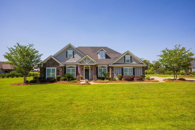 5643 Timberwind Cir, Lake Park, GA 31636 - craftsman-style house featuring a front lawn, stone siding, and board and batten siding