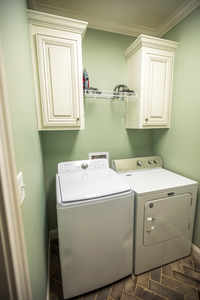 5643 Timberwind Cir, Lake Park, GA 31636 - washroom with washing machine and dryer, cabinet space, crown molding, and baseboards
