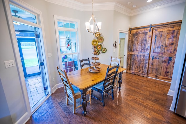 5643 Timberwind Cir, Lake Park, GA 31636 - dining room featuring dark wood-type flooring, a chandelier, ornamental molding, and baseboards