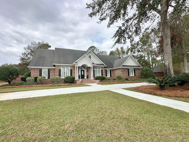 view of front of property with a front lawn