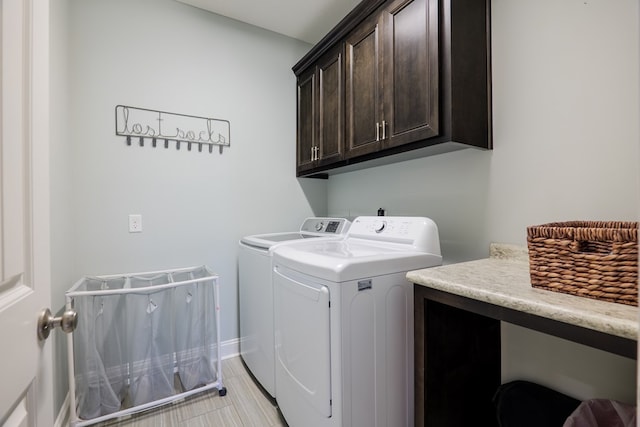 5555 Boyette Rd, Hahira, GA 31636 - clothes washing area with cabinet space and washing machine and dryer