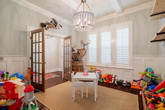 5555 Boyette Rd, Hahira, GA 31636 - game room with wood finished floors, french doors, a decorative wall, a chandelier, and crown molding
