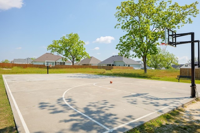 view of sport court with community basketball court and fence