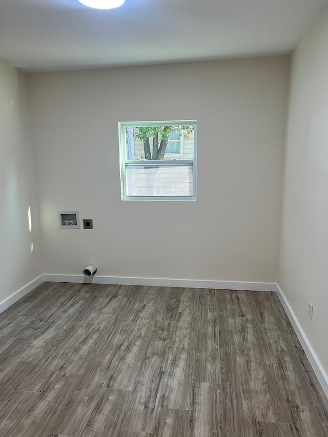 laundry area featuring washer hookup, dark hardwood / wood-style flooring, and electric dryer hookup