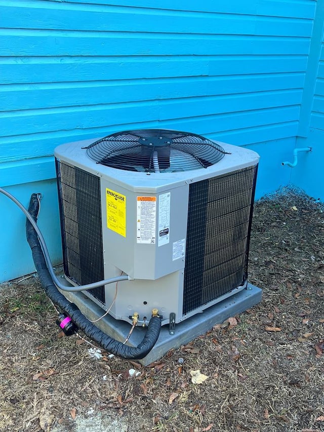 exterior details featuring cooling unit