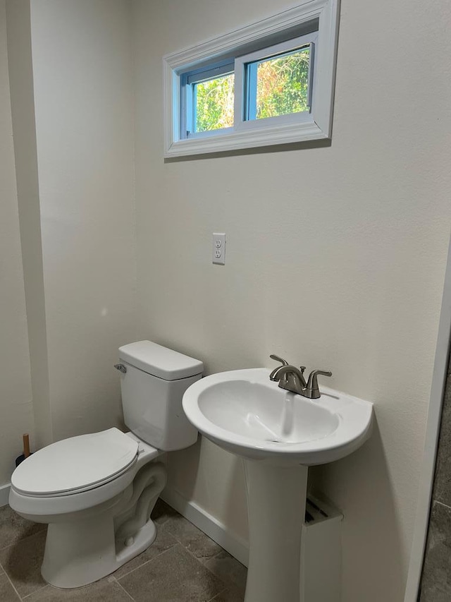 bathroom featuring toilet