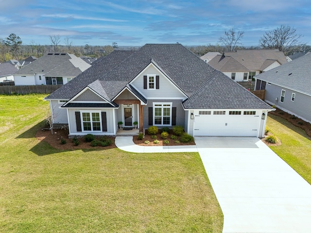 3041 Houser Way, Hahira, GA 31632 - view of front facade featuring a front lawn, a garage, driveway, and a shingled roof