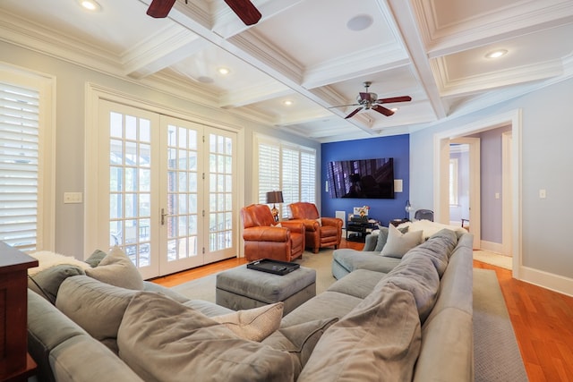 living area with ceiling fan, beamed ceiling, baseboards, and recessed lighting