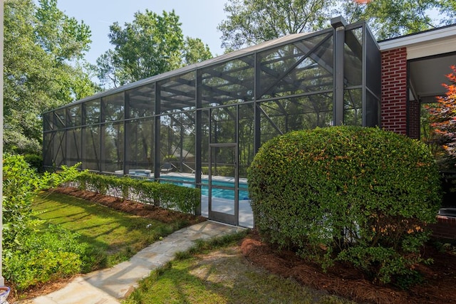 exterior space with an outdoor pool