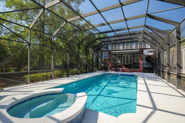 4333 Spring Branch Cir, Valdosta, GA 31601 - view of pool featuring a patio, a pool with connected hot tub, and a lanai