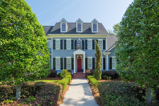 view of front facade with a shingled roof