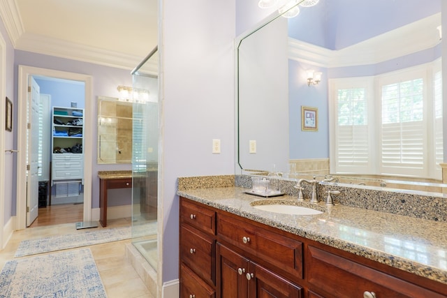 4333 Spring Branch Cir, Valdosta, GA 31601 - full bathroom with a shower stall, vanity, tile patterned flooring, ornamental molding, and a walk in closet