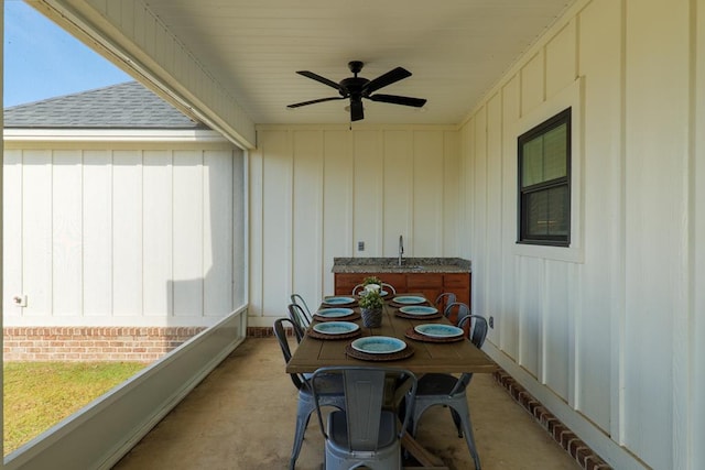 exterior space featuring ceiling fan, a wealth of natural light, and sink