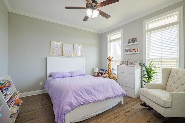 bedroom featuring ceiling fan, dark hardwood / wood-style flooring, and ornamental molding