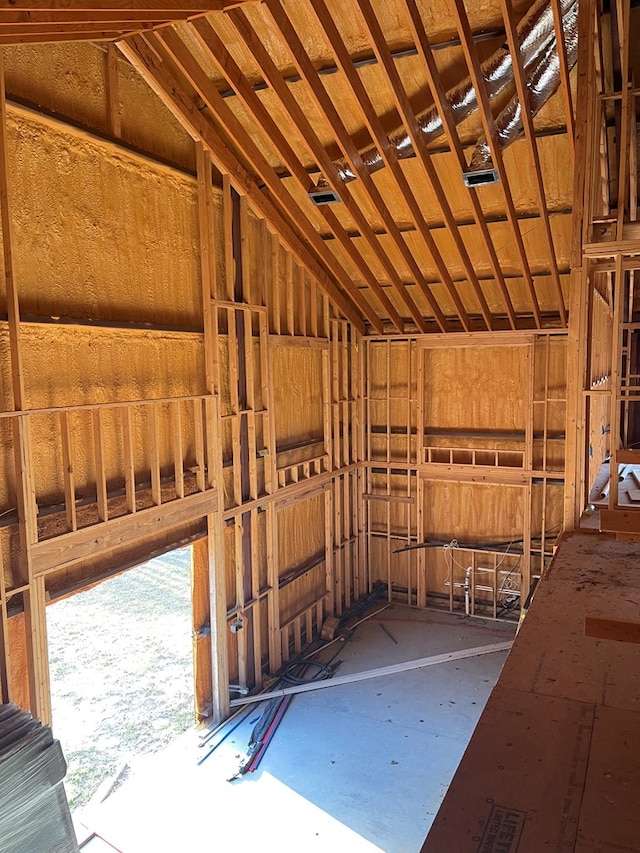misc room with vaulted ceiling